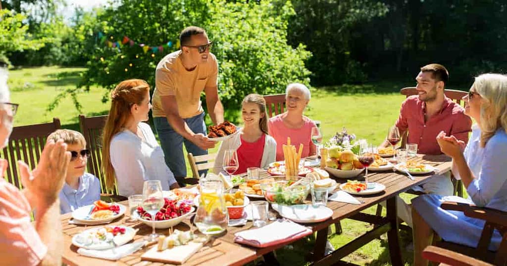 Family backyard BBQ in Holly Ridge Element Fence Company