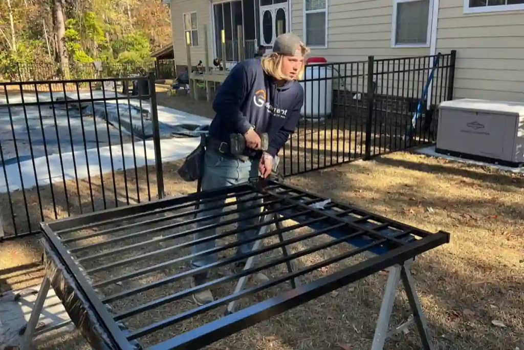 Element Fence Company Installing an aluminum fence in Sneads Ferry